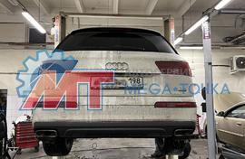 Замена передних тормозных колодок и техническое обслуживание автомобиля Audi Q7