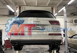 Замена передних тормозных колодок и техническое обслуживание автомобиля Audi Q7